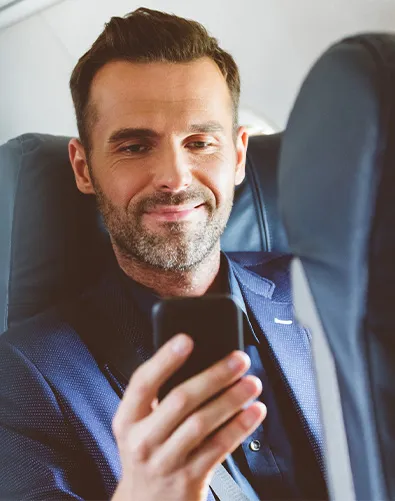 Man reads on mobile phone