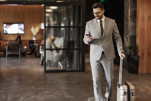 Construction worker reading documents on a construction site