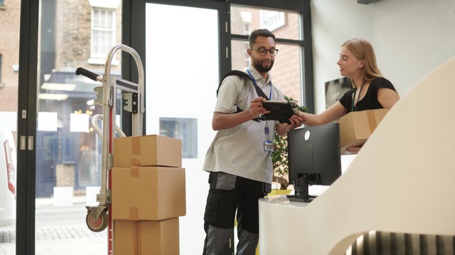 The master teaches the apprentice in the workshop