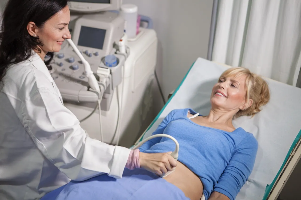 Patient lies down and has an ultrasound examination