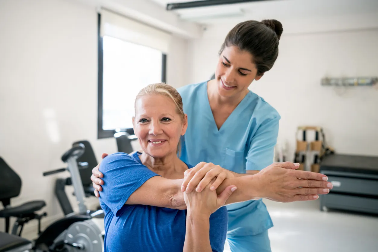 Therapist with exercises with the patient