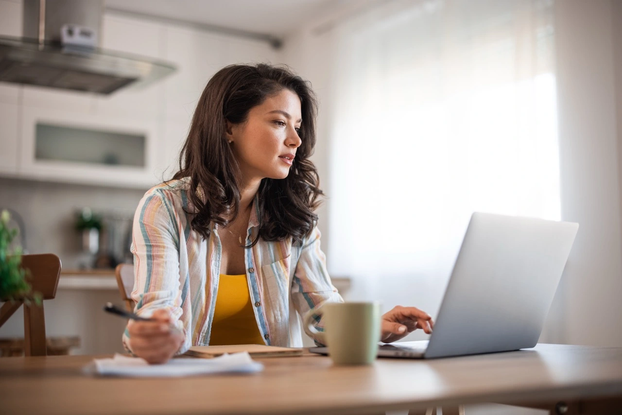 Woman is working on laptop